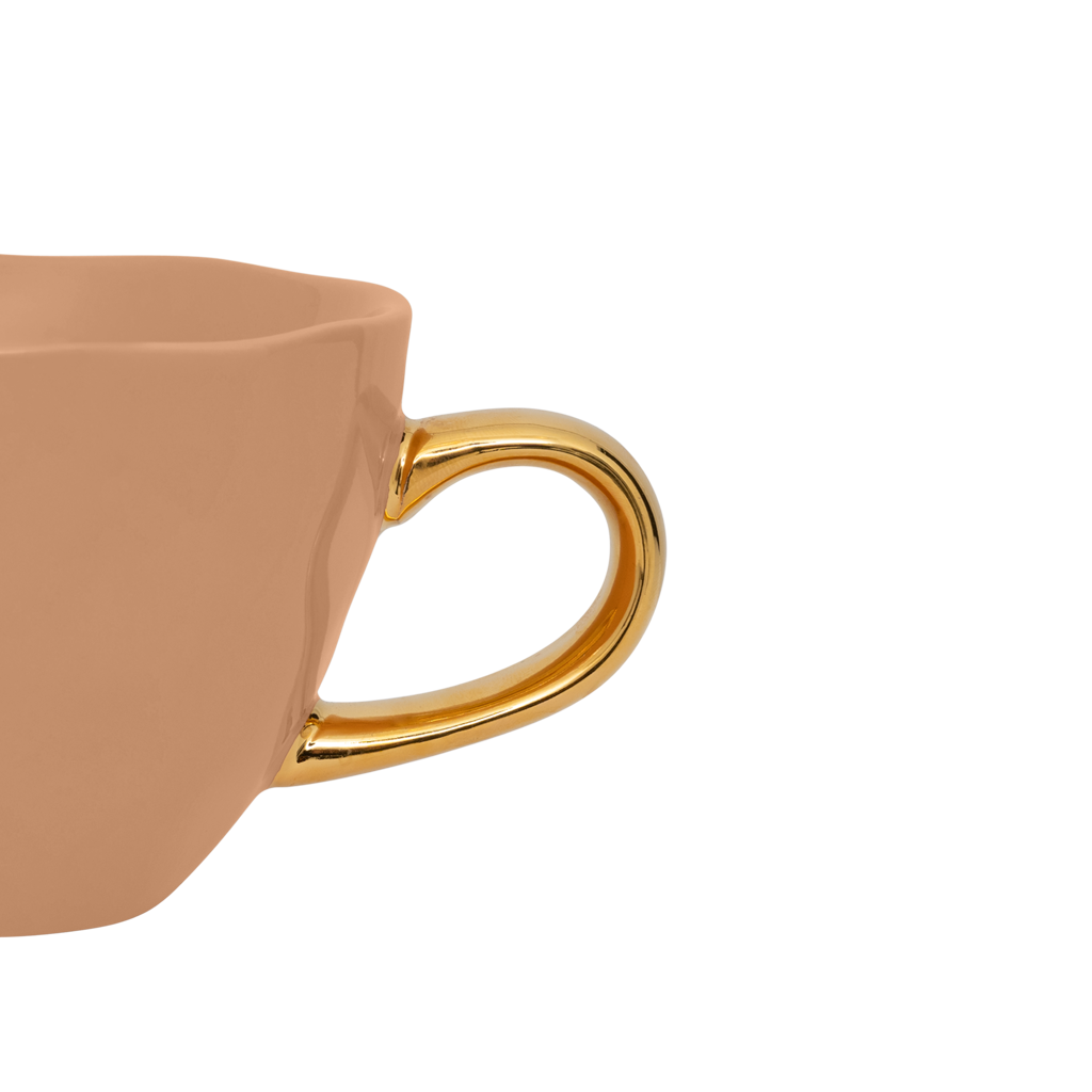 Part of the Good Morning Collection. Cappuccino cup in the colour clay With a hand-painted golden ear. Colour clay a mid tone pastel.
