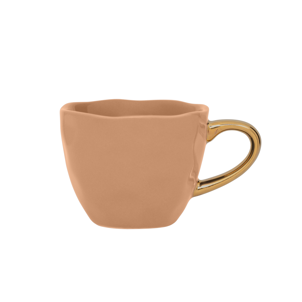 Part of the Good Morning Collection. Espresso cup in the colour clay With a hand-painted golden ear. Colour clay a mid tone pastel.