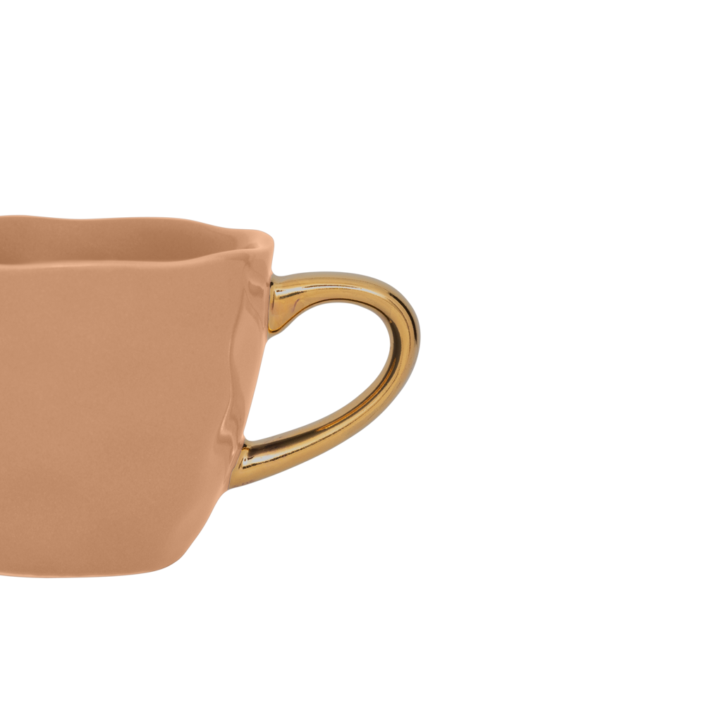 Part of the Good Morning Collection. Espresso cup in the colour clay With a hand-painted golden ear. Colour clay a mid tone pastel.