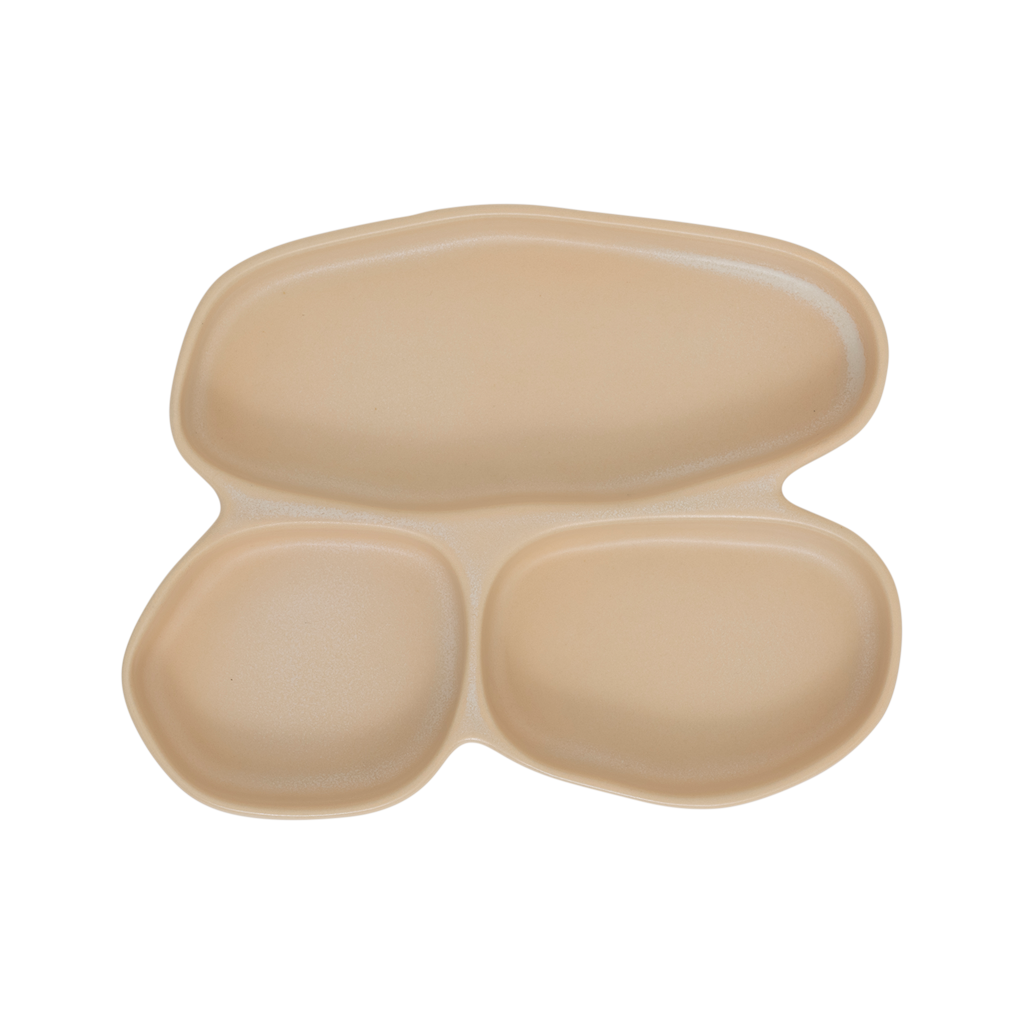 A sculptural, organic, contemporary snack bowl with three compartments made from a balanced mix of recycled and virgin ceramics in a subtle matt reactive glaze. In the soft and airy colour sea mist.