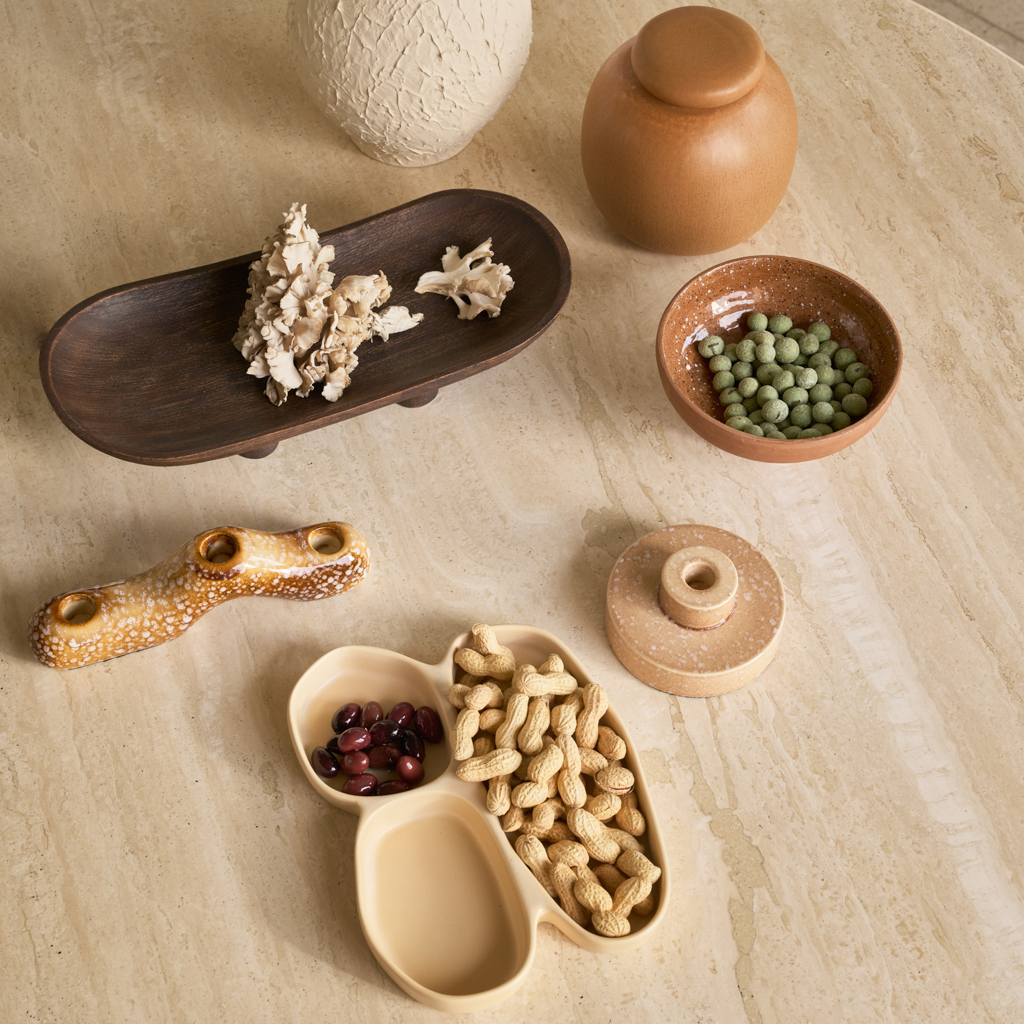 A sculptural, organic, contemporary snack bowl with three compartments made from a balanced mix of recycled and virgin ceramics in a subtle matt reactive glaze. In the soft and airy colour sea mist.