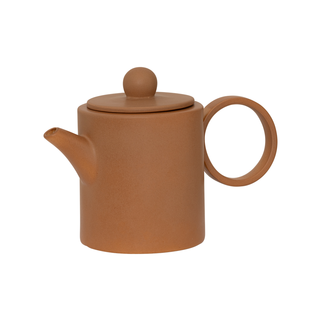 A small teapot for two cups with a refined, contemporary look, finished in a matt reactive mid- brown glaze, featuring a large rounded handle. Made from a balanced mix of recycled and virgin ceramics.
