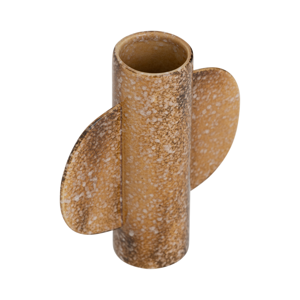 A small bodied vase featuring two organically shaped half-circle ears on the sides, finished in a lively brown shiny reactive glaze with outspoken tonal variation. Made from a balanced mix of recycled and virgin ceramics. One-flower vase.