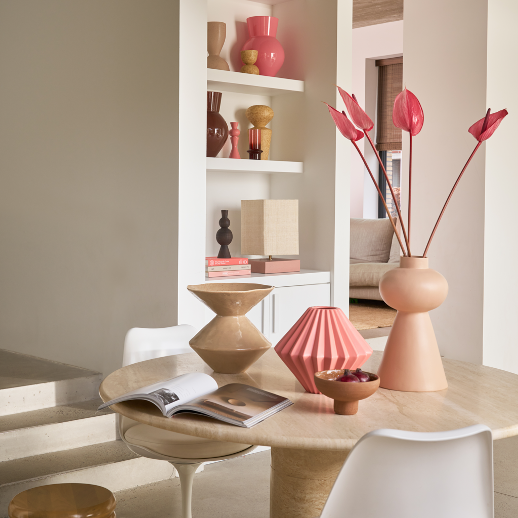Sculpted diamond shaped vase with three-dimensional pleat-effect. Crafted from a balanced mix of recycled and virgin ceramics in the romantic colour blush. Matt finish, statement vase