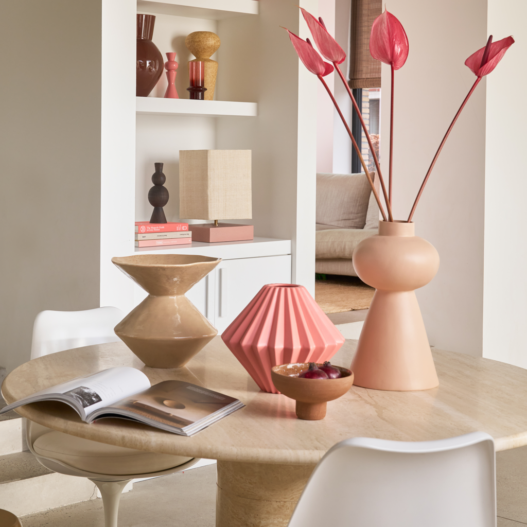 Sculpted diamond shaped vase with three-dimensional pleat-effect. Crafted from a balanced mix of recycled and virgin ceramics in the romantic colour blush. Matt finish, statement vase