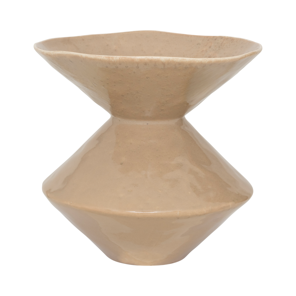 A round ceramic vase featuring indentations that widen in a zigzag rhythm, gently battered, in a muted, earthy taupe colour in a shiny reactive glaze.