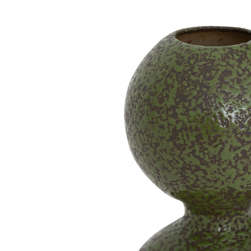 A vase composed of two smoothly stacked, flowing spheres, finished in the rich colour banana palm on a darkbrown base, in a reactive glaze. Crafted from a balanced mix of recycled and virgin ceramics.