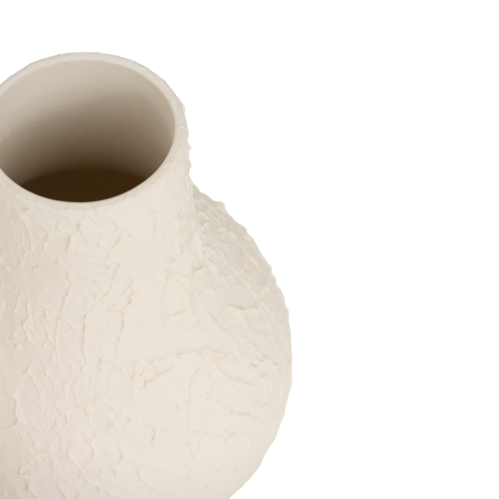 Flowing feminine design vase, made from ceramic with a matt spatulated tactile surface in the colour almond milk.