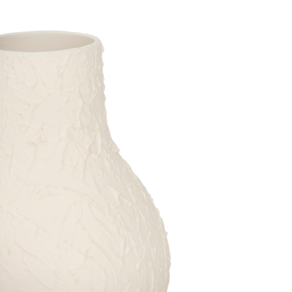Flowing feminine design vase, made from ceramic with a matt spatulated tactile surface in the colour almond milk.