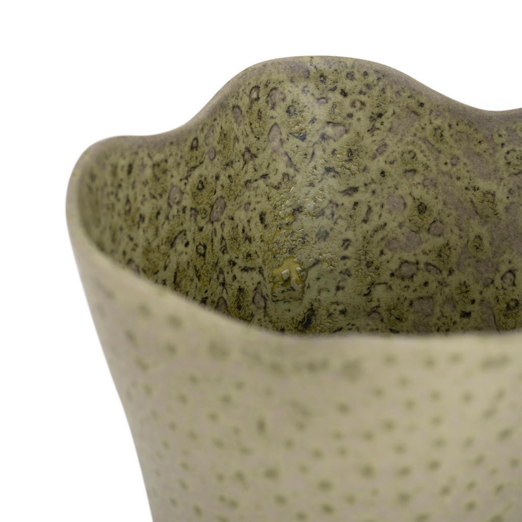 An elegant flared ceramic vase with a softly curved rim in a soft eucalyptus colour with a subtile matt special reactive glaze.