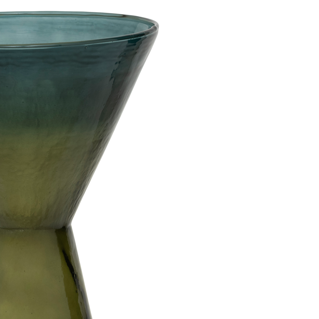 Recycled glass, transparant coloured vase in a statement hourglass shape, with clean, straight lines that meet at the centre. A gradient of two colours of green- banana palm for the body and green heron on the top
