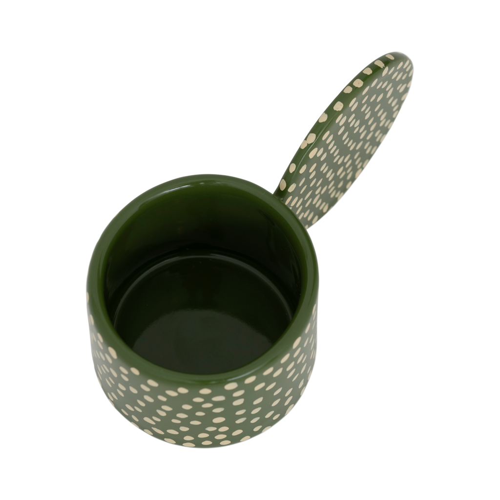An XL tealight holder crafted from a mix of recycled and virgin ceramics. In a playful design with big ear and in a finish of handmade organic dots. In a vibrant banana palm base colour with vanilla coloured dots.