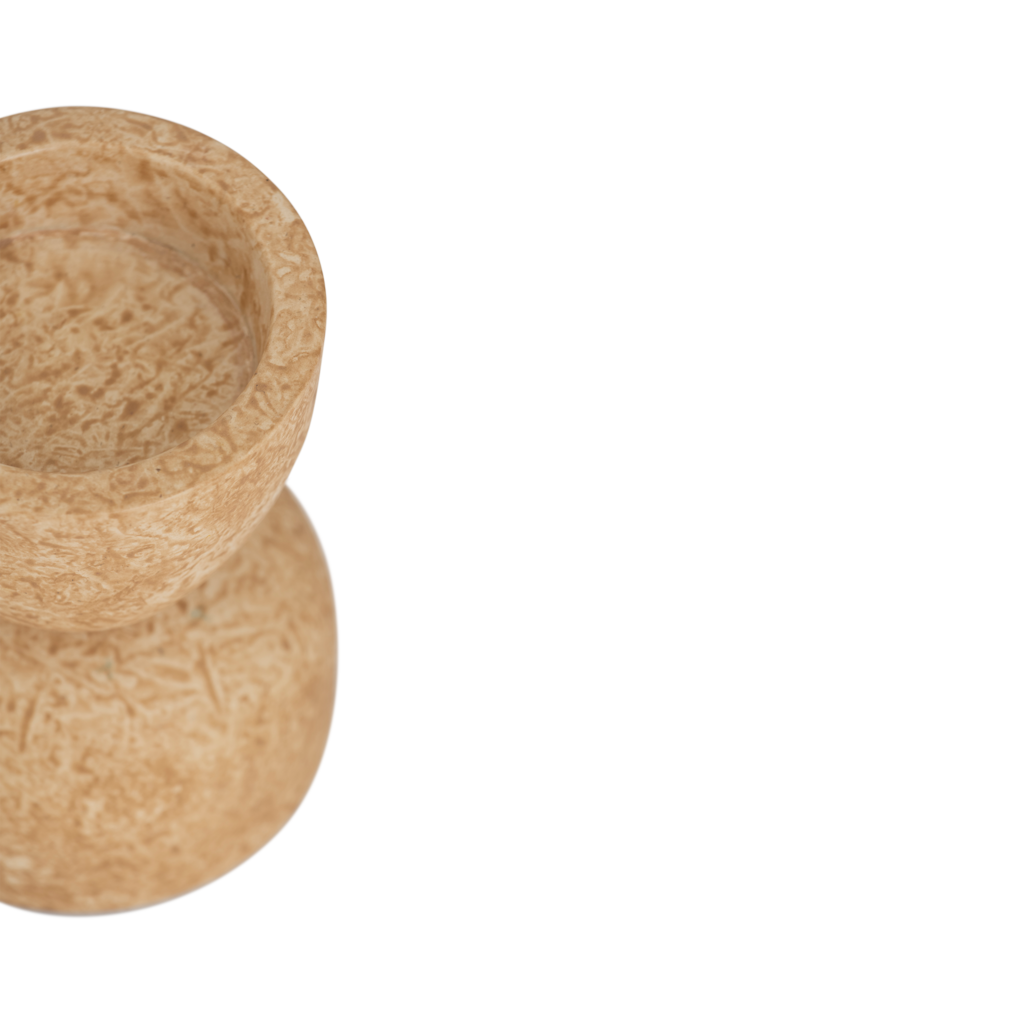 A xl tealight holder with a gently curved hourglass silhouette, in the colour pale khaki. The matt sponging technique adds a soft, layered effect in the finish, giving the piece visual interest. Made from a balanced mix of recycled and virgin ceramics.