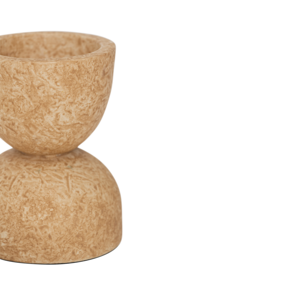 A xl tealight holder with a gently curved hourglass silhouette, in the colour pale khaki. The matt sponging technique adds a soft, layered effect in the finish, giving the piece visual interest. Made from a balanced mix of recycled and virgin ceramics.