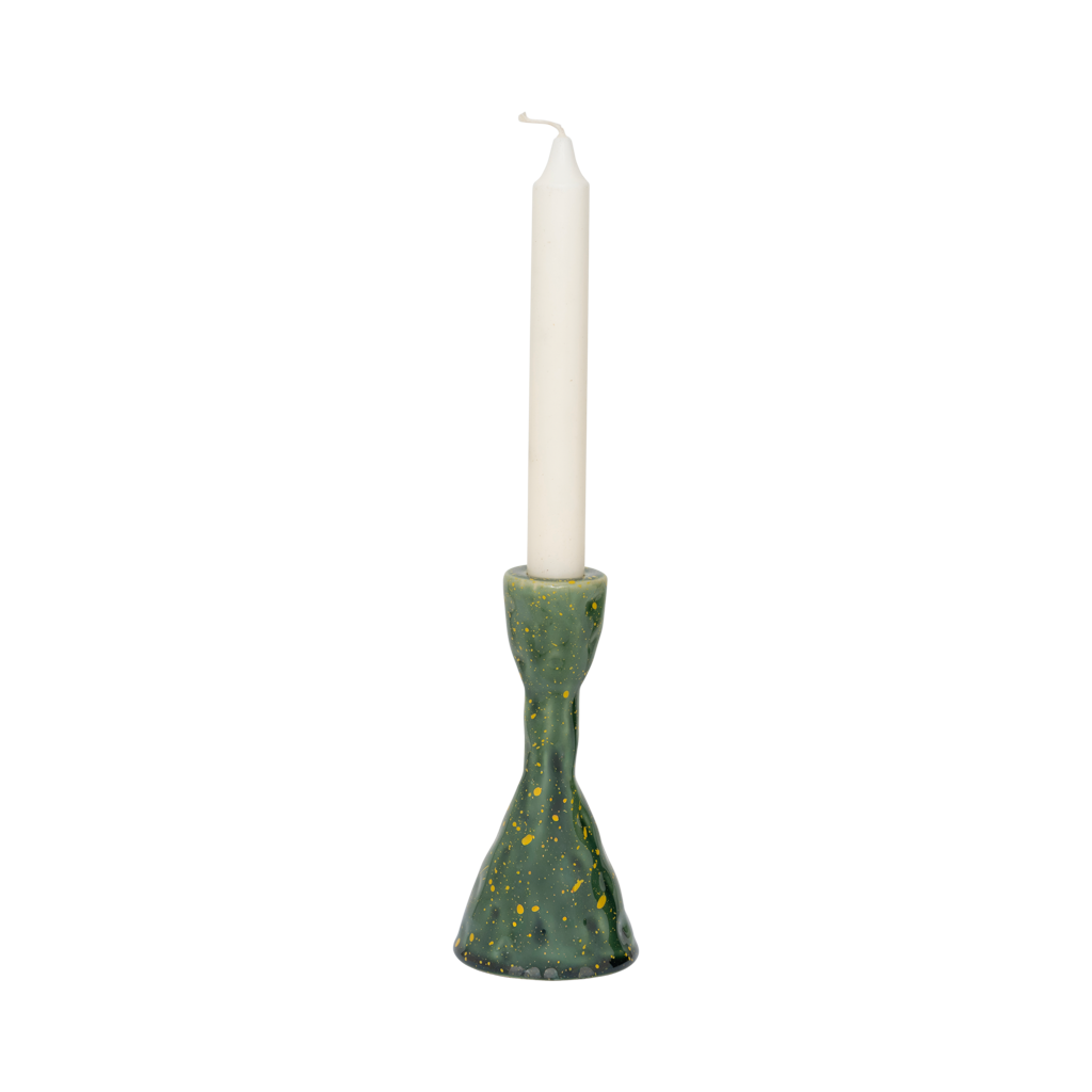 A handmade organically shaped candleholder, made from a balanced mix of recycled and virgin ceramics. An expressive reactive glaze in a vibrant banana palm colour.