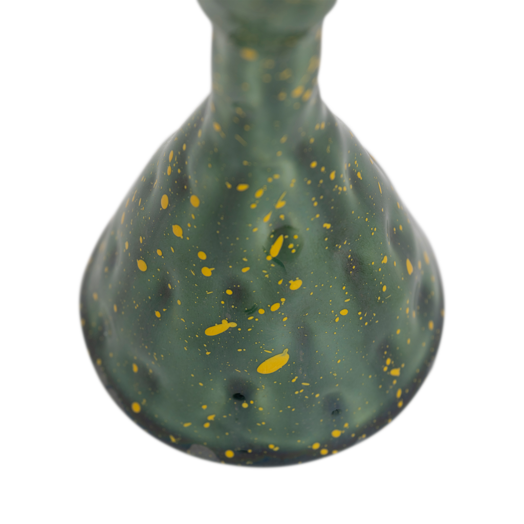 A handmade organically shaped candleholder, made from a balanced mix of recycled and virgin ceramics. An expressive reactive glaze in a vibrant banana palm colour.