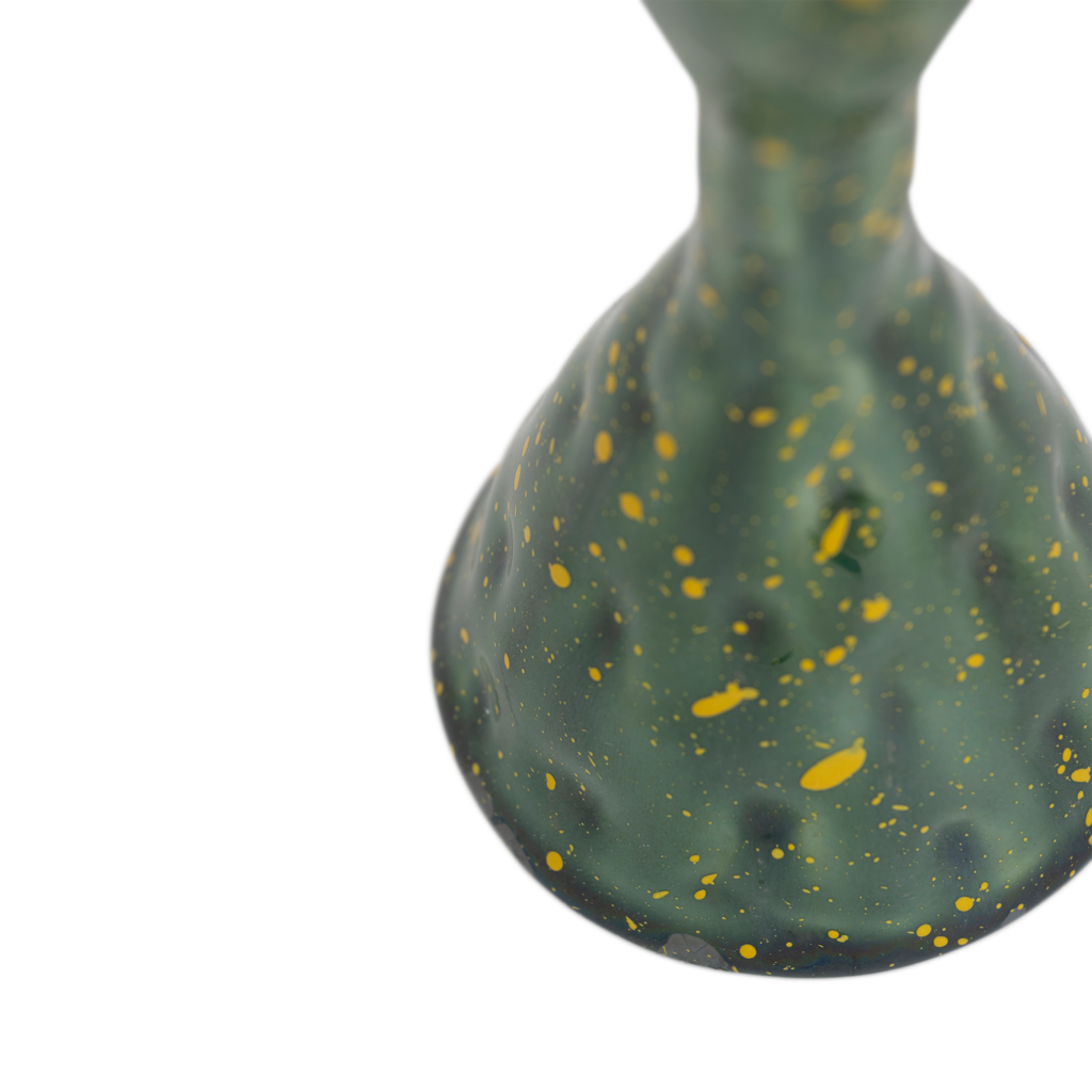 A handmade organically shaped candleholder, made from a balanced mix of recycled and virgin ceramics. An expressive reactive glaze in a vibrant banana palm colour.