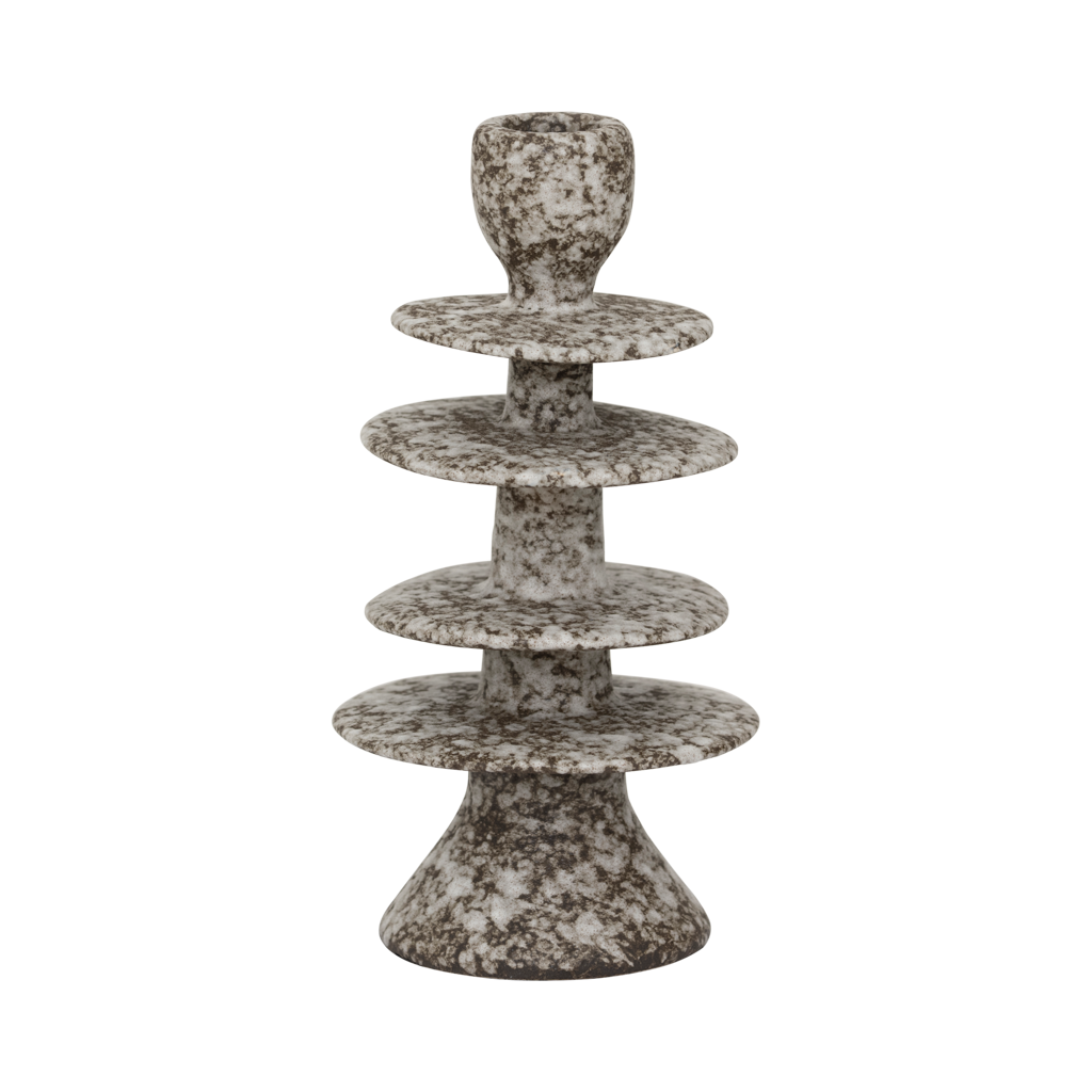 A candleholder in an expressive reactive glaze in a downtown brown colour, composed of layered irregular discs Crafted from a balanced mix of recycled and virgin ceramics.