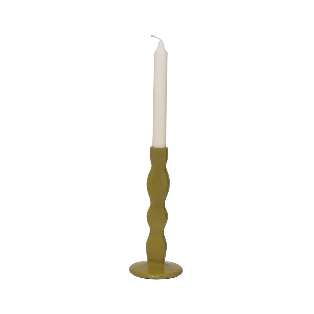 A candleholder with a gentle, flowing form and a lightly battered skin, in the muted natural colour evergreen sprig and in a shiny finsh. Made from a balanced mix of recycled and virgin ceramics.