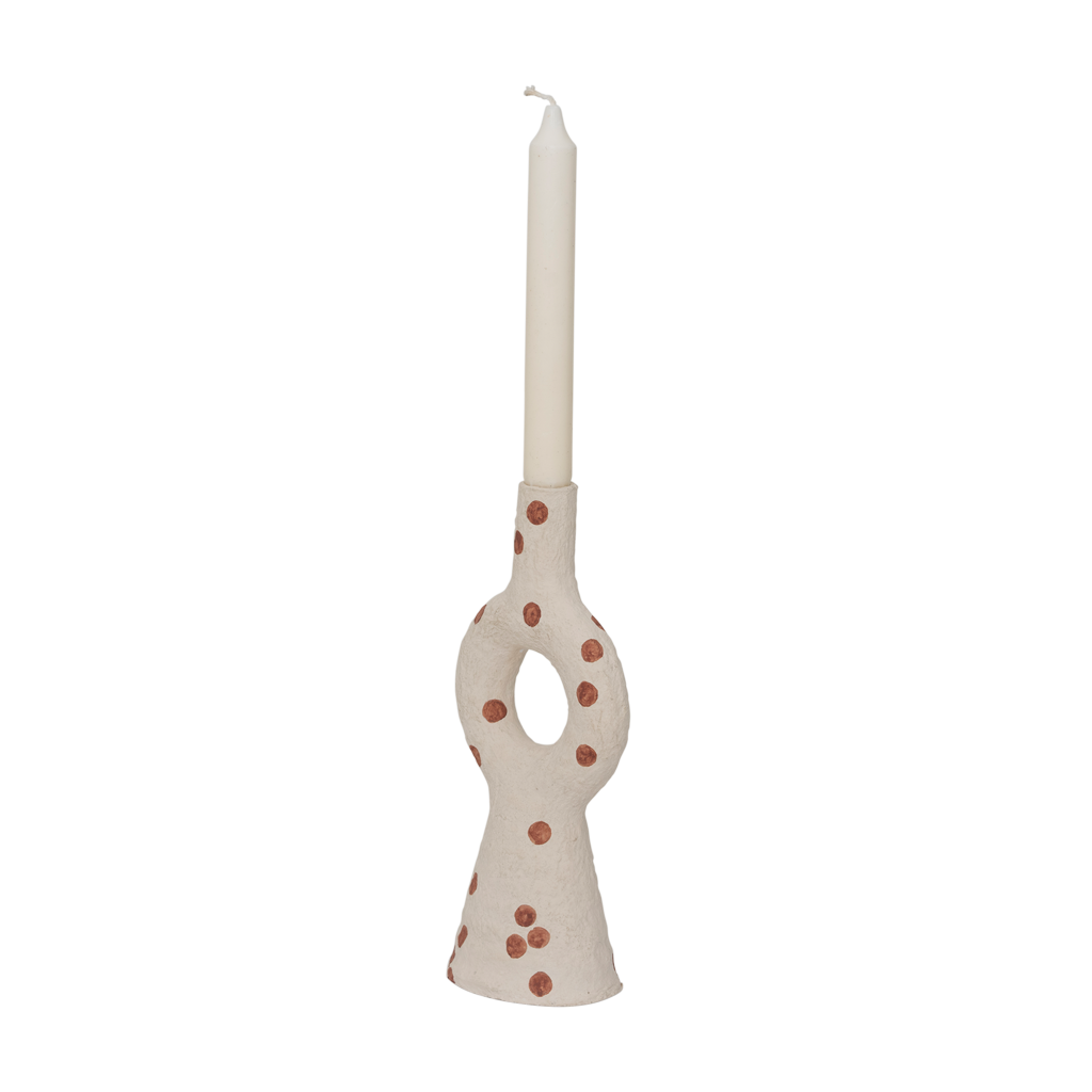 A cotton mache candleholder with an organic and harmonious form. In the soft almond milk colour and decorated with irregular playful dots.