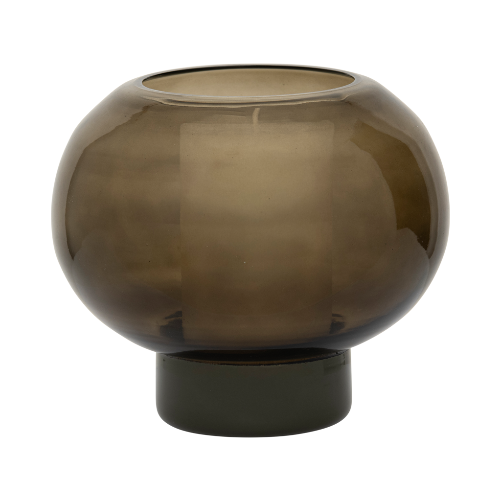 A recycled glass candleholder in deep, earthy kalamata, with a sculptural, graphic shape.