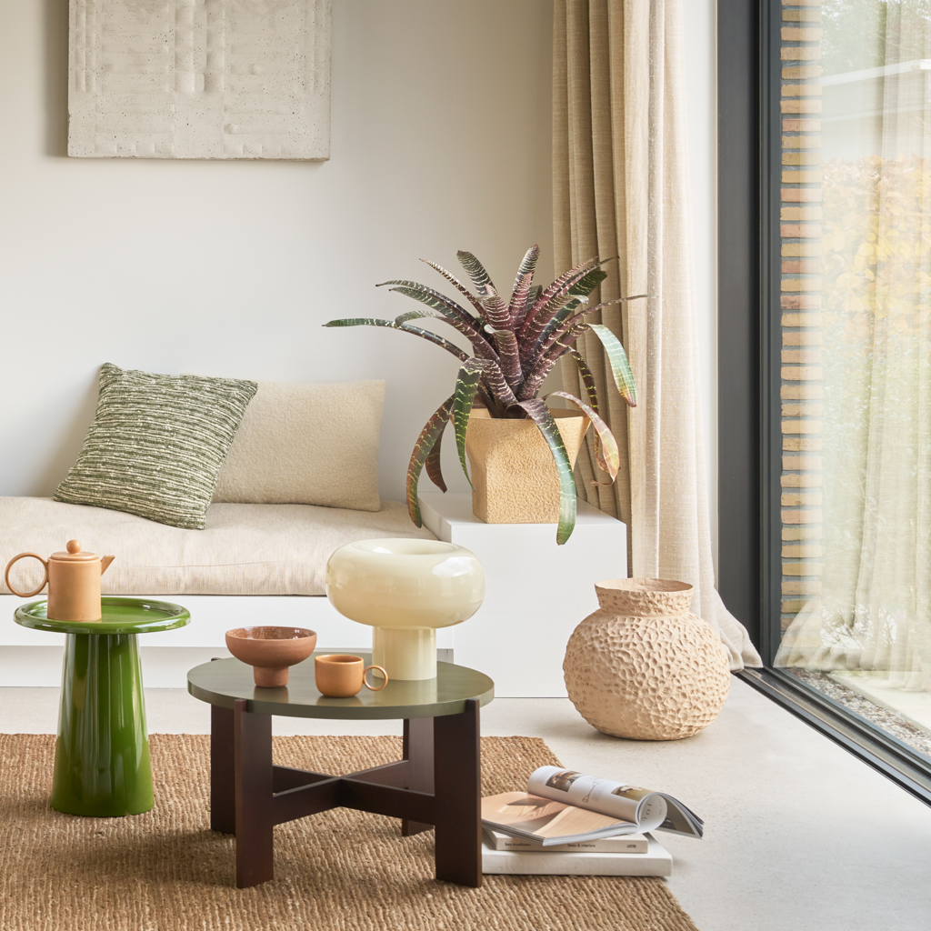 Cosy rectangular off-white wool blend cushion with a soft, textured weave.