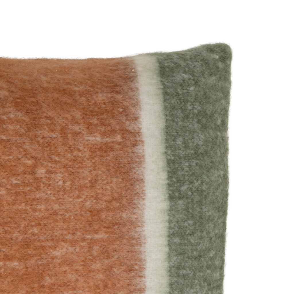 A brushed wool blend decorative cushion featuring bold vertical stripes in a contrast mix of warm, earthy tones.