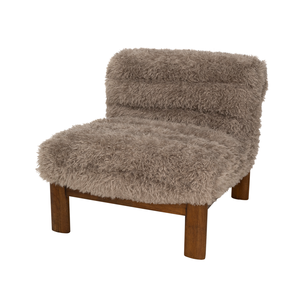 A lounge chair with visible rubber wood legs and a quilted and padded cushioned seat in a draped design. Made from a fluffy poodle fabric in the versatile colour taupe.