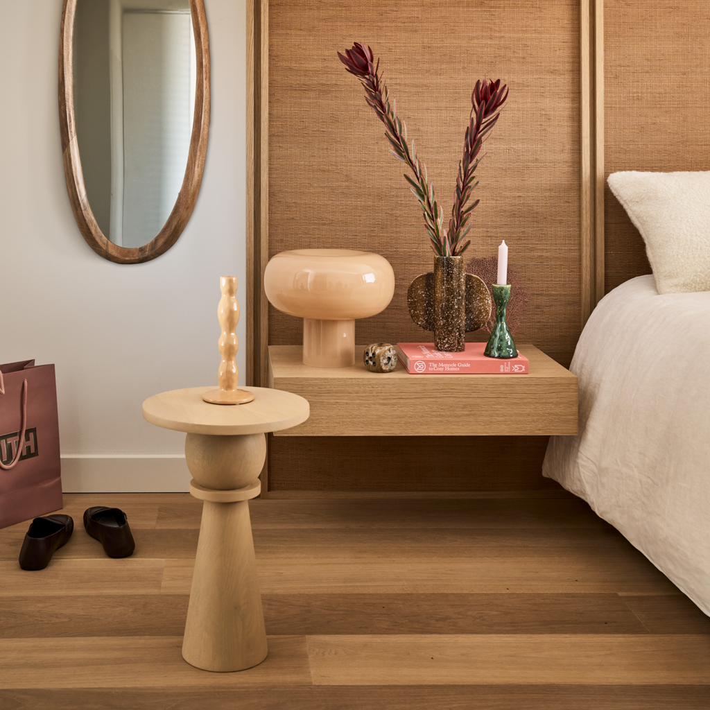 A harmonious composition of layered forms in the soft colour light oak. Solid wood. Made of eco-friendly mangowood, of which the timber is harvested after the mango tree passed its fruit-bearing life span.