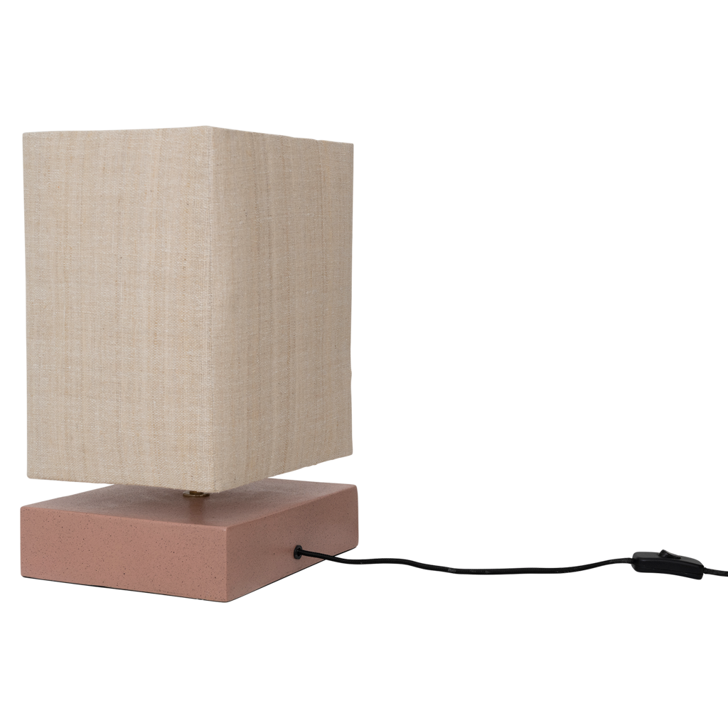 Table lamp with a rectangular beige linen shade and base made from a balanced mix of recycled and virgin ceramics. A minimalist, straight form, finished in matt rose smoke with a subtle speckle.