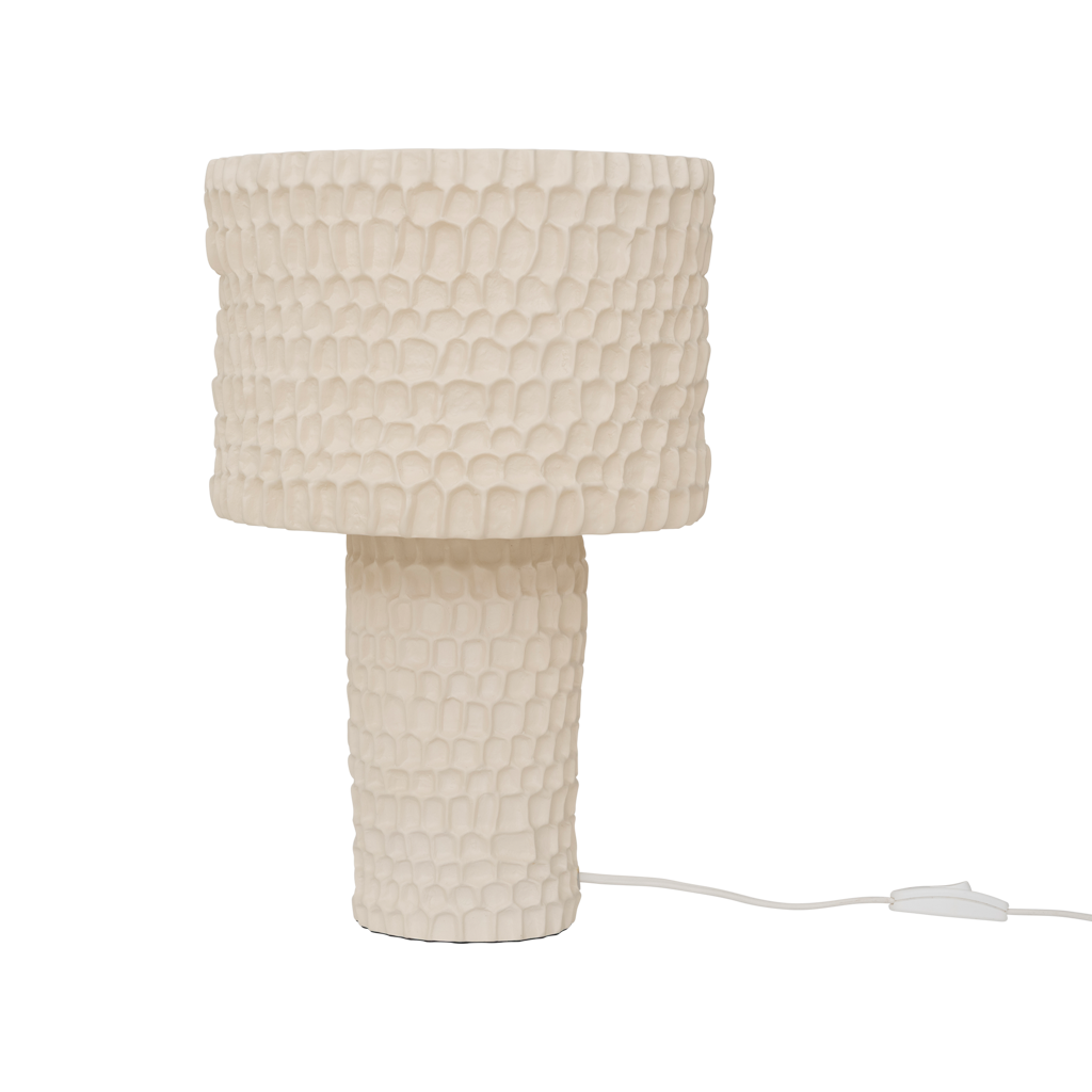 A skillful handmade fully textured matt ceramic table lamp in the calm colour Almond Milk. Expressive and outstanding design.