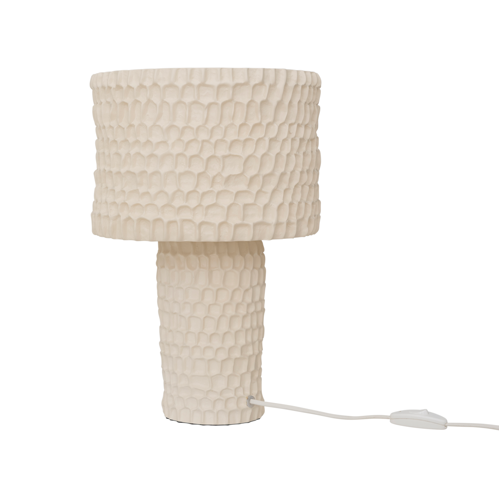 A skillful handmade fully textured matt ceramic table lamp in the calm colour Almond Milk. Expressive and outstanding design.