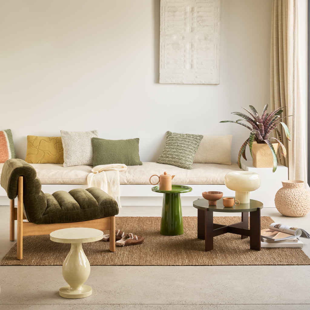 Handcrafted recycled opaque glass table lamp from Portugal with a straight base and donut-shaped top, with smooth curves in the soft and uplifting colour eucalyptus.