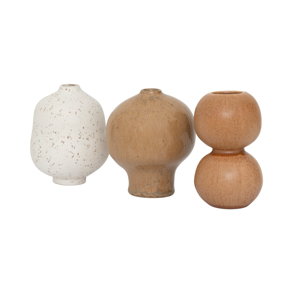 A set of three mini vases in natural tones. Reactive and textured glazes, each with its own organic, sculptural shape. Made from a balanced mix of recycled and virgin ceramics.