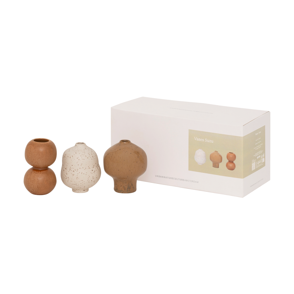 A set of three mini vases in natural tones. Reactive and textured glazes, each with its own organic, sculptural shape. Made from a balanced mix of recycled and virgin ceramics.