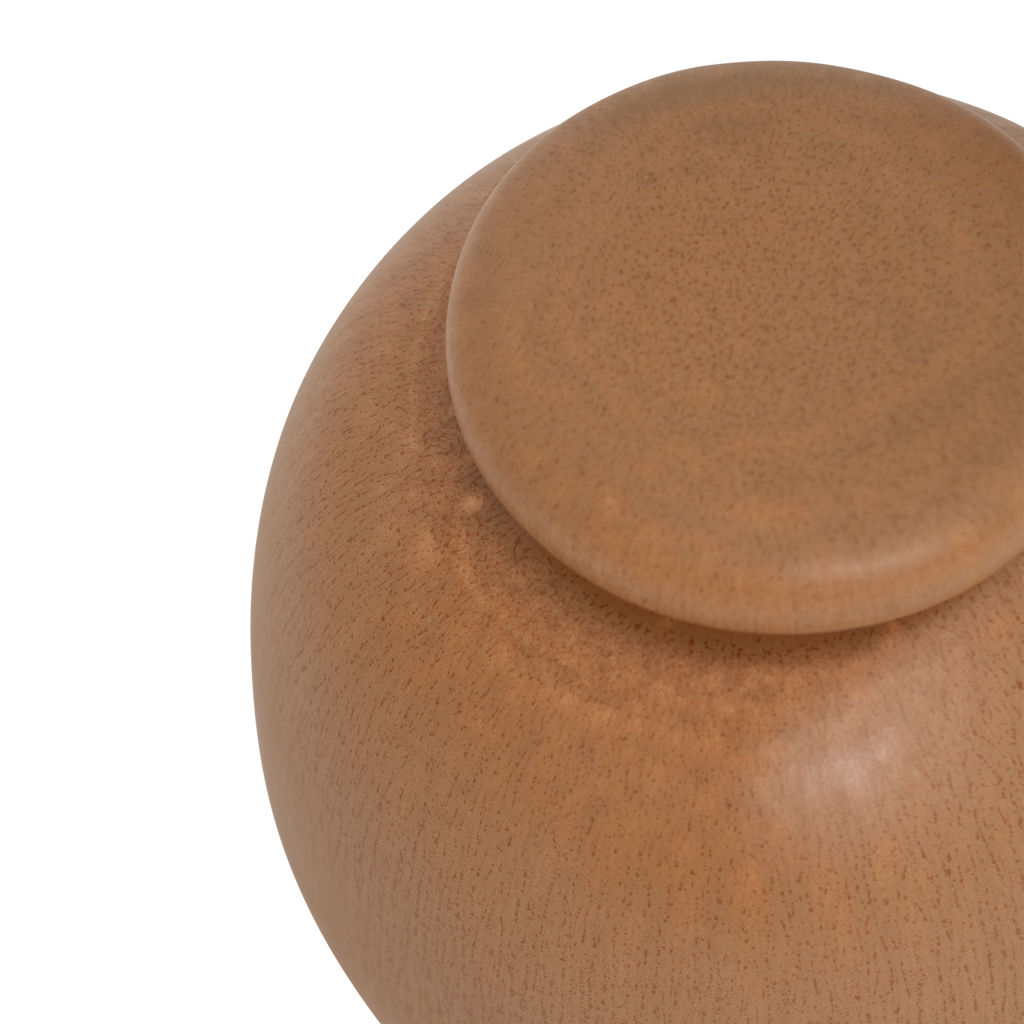 A round shaped storage jar with a gently rounded, substantial lid, finished in a inviting mid-brown matt reactive glaze. Made from a balanced mix of recycled and virgin ceramics.